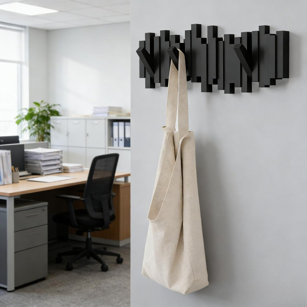 Black wooden wall coat rack with eight hooks