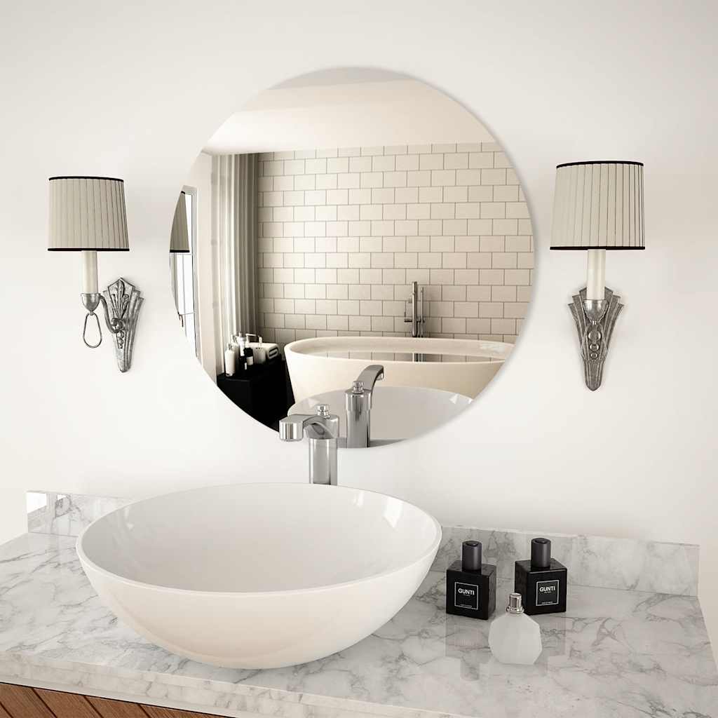Round mirror shown to scale on a wall