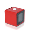 DreamCube inkless sticker printer in red, front three-quarter view
