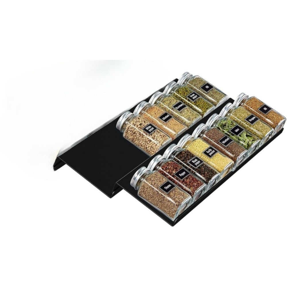 Spice drawer organiser holding jars tilted for reading